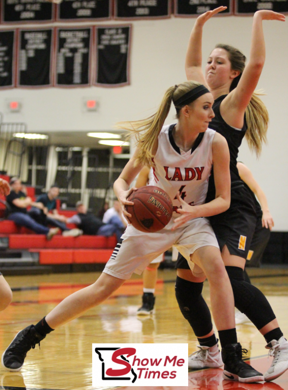 Dexter Powers Through Naylor for a 62-51 Win
