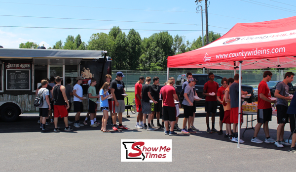 Two Local Businesses Treat Athletes to Cook-Out