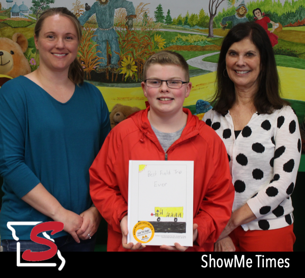 4th Grade Student Tanner Massey Donates Book to Keller Library