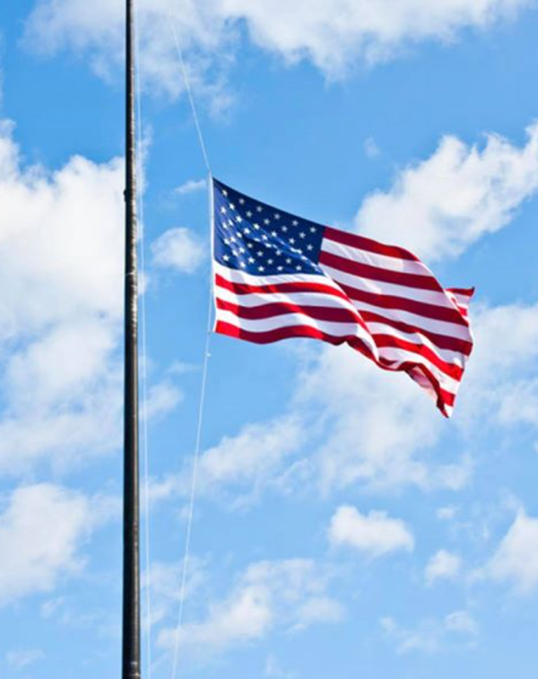 United States Flag at half-staff in Honor of National Fallen Firefighters Memorial Day on Sunday