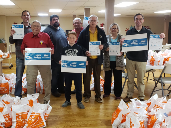 Dexter Rotary Club Packs Blizzard Bags for The Lunch Box
