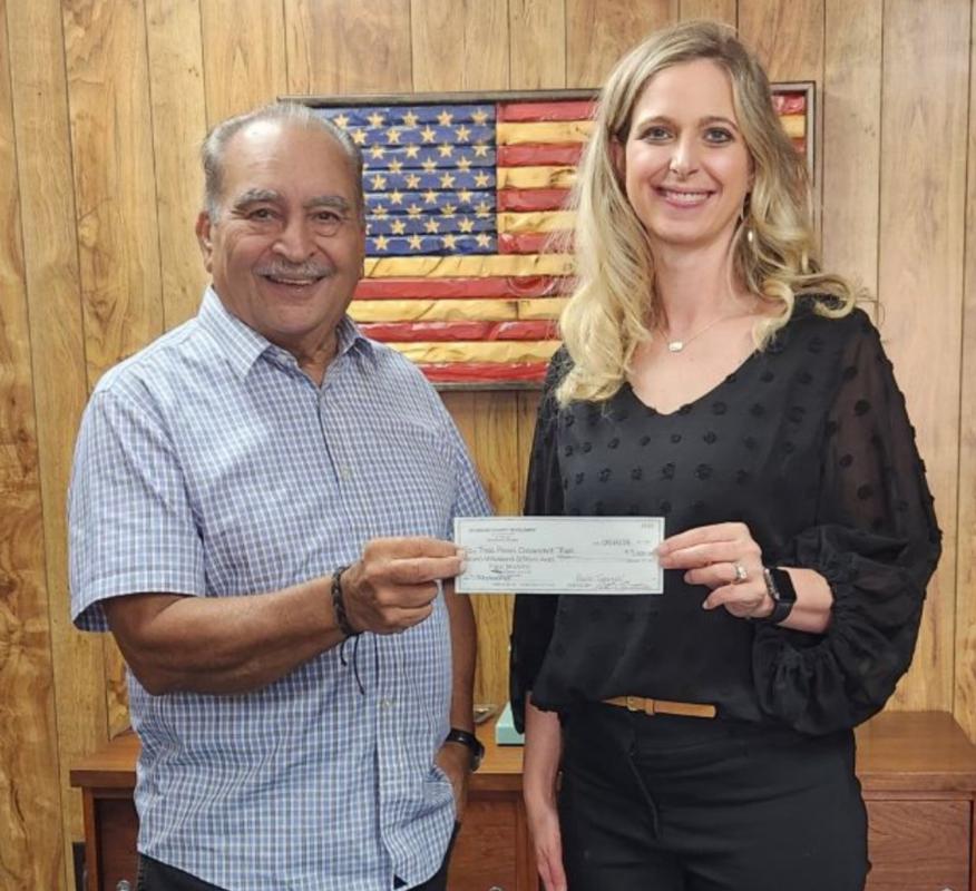 Coutavas Presents Reynolds with Scholarship Monies for Three Rivers College